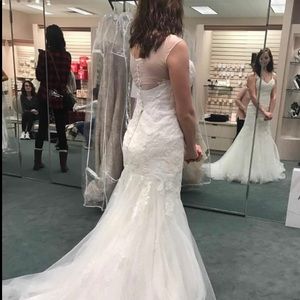Brand new unaltered wedding dress